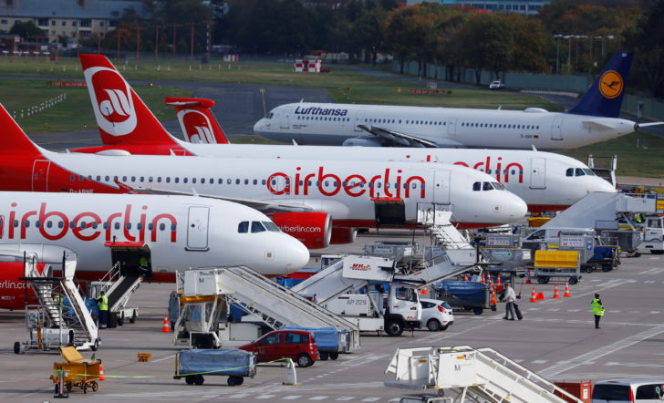 A Lufthansa airliner taxis next to the Air Berlin aircrafts at Tegel airport in Berlin