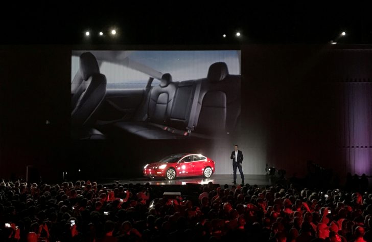 FILE PHOTO: Tesla Chief Executive Elon Musk introduces one of the first Model 3 cars in Fremont California