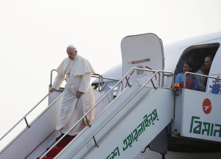 Pope Francis arrives at the airport in Dhaka