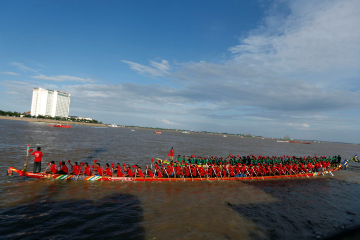 Participants row their boat during the annual Water Festival on the Tonle Sap river in Phnom Penh, Cambodia