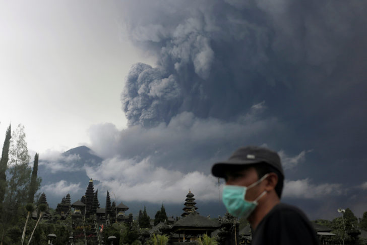 Mount Agung volcano erupts as seen from Besakih Temple in Karangasem, Bali