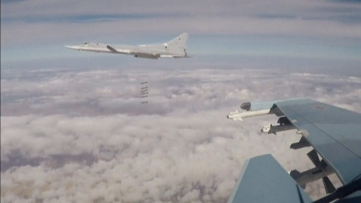 A still image from video shows Russian long-range bombers hitting Islamic State targets in the northeast of Syria