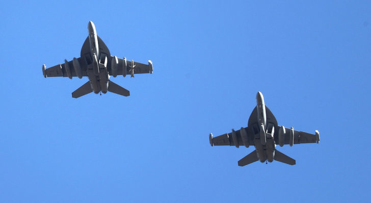 U.S. Air Force EA-18G Growler fighter jets fly over the Osan Air Base in Pyeongtaek