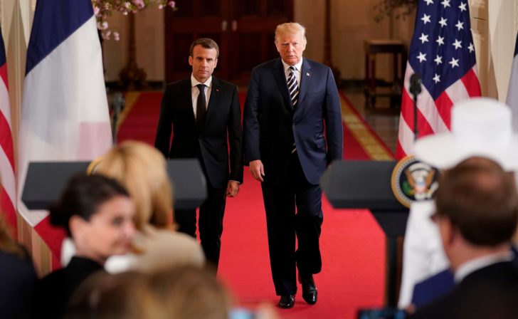 French President Macron and U.S. President Trump arrive for their joint news conference at the White House in Washington