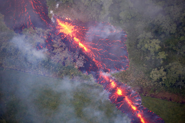 Lava erupts from a fissure east of the Leilani Estates subdivision during ongoing eruptions of the Kilauea Volcano