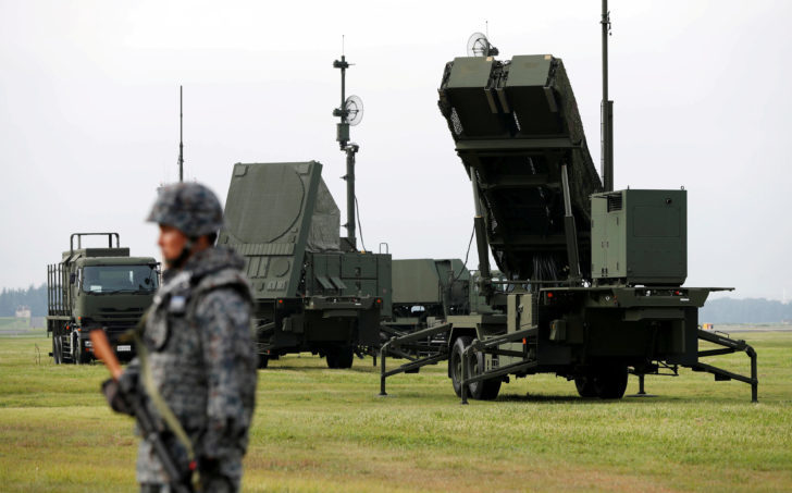 FILE PHOTO: JSDF soldier takes part in a drill to mobilise their PAC-3 missile unit at U.S. Air Force Yokota Air Base in Fussa กลาโหมญี่ปุ่นของบประมาณเพิ่มขึ้นอีก ไว้รับมือกับภัยคุกคามจากเกาหลีเหนือ