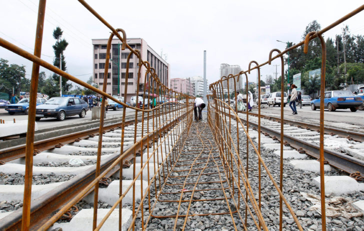 FILE PHOTO: A labourer works at a light railway transit system under construction in Ethiopia's capital Addis Ababa
