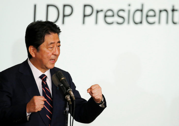 Japan's Prime Minister Shinzo Abe, who is also the ruling Liberal Democratic Party leader's (LDP) leader, speaks after winning the leadership vote at the party's headquarters in Tokyo