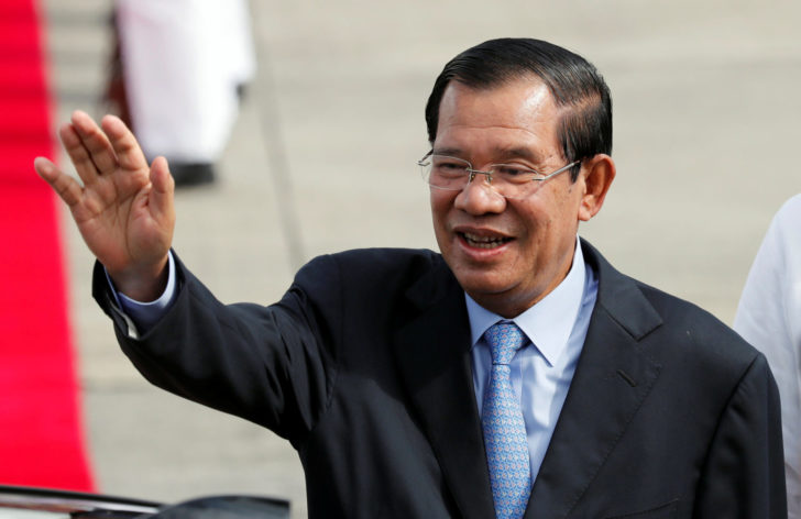 Cambodia's Prime Minister Hun Sen waves to well wishers upon his arrival to attend the Association of South East Asian Nations (ASEAN) Summit and related meetings in Clark, Pampanga