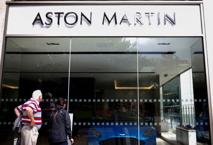 FILE PHOTO: An Aston Martin logo is seen on the outside of a dealership in central London
