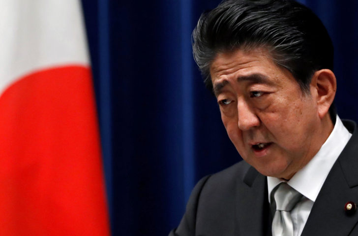 Japan's PM Abe attends a news conference after reshuffling his cabinet, at his official residence in Tokyo