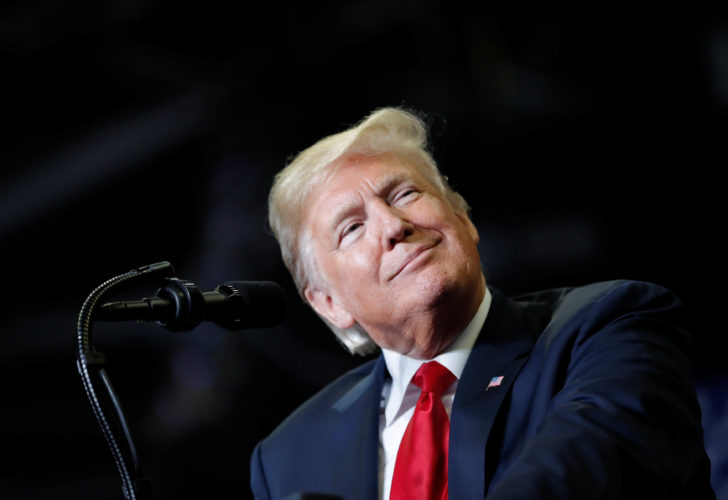 U.S. President Donald Trump acknowledges supporters at a campaign rally at the Show Me Center in Cape Girardeau Missouri