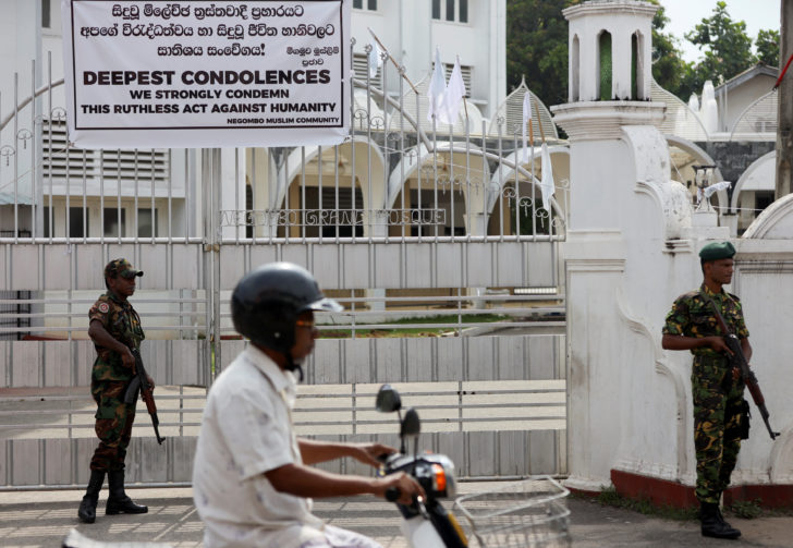 Soldiers stand guard outside the Grand Mosque in Negombo