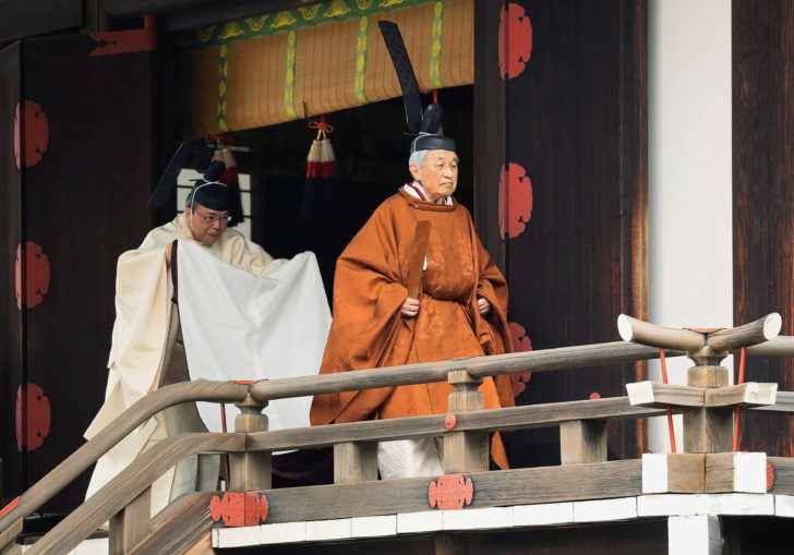Japan's Emperor Akihito walks for a ritual called Taiirei-Tojitsu-Kashikodokoro-Omae-no-gi, a ceremony for the Emperor to report the conduct of the abdication ceremony, at the Imperial Palace in Tokyo