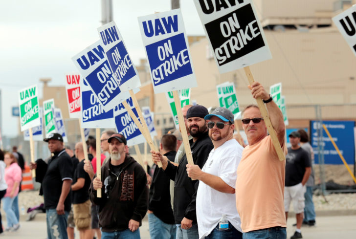 General Motors assembly workers picket outside the General Motors Flint Assembly plant during the United Auto Workers (UAW) national strike in Flint