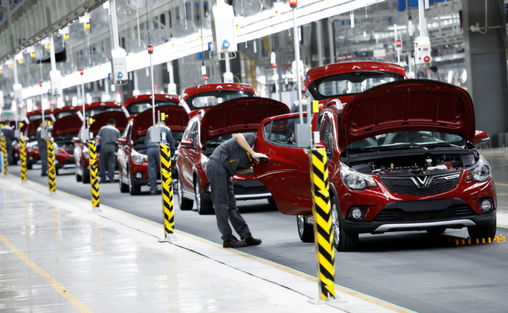 Labourers work at Vinfast auto plant on the occasion of its opening ceremony in Hai Phong city