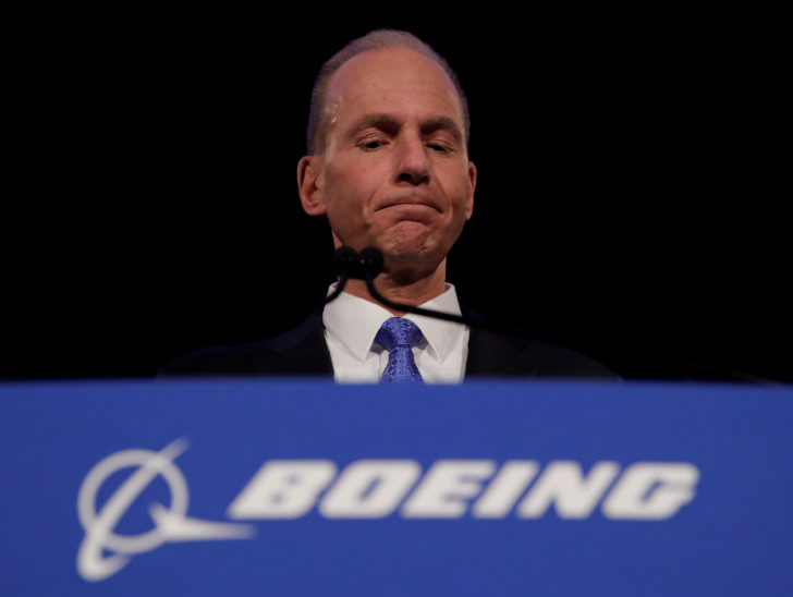 FILE PHOTO: Boeing Co Chief Executive Dennis Muilenburg pauses while speaking during a news conference at the annual shareholder meeting in Chicago