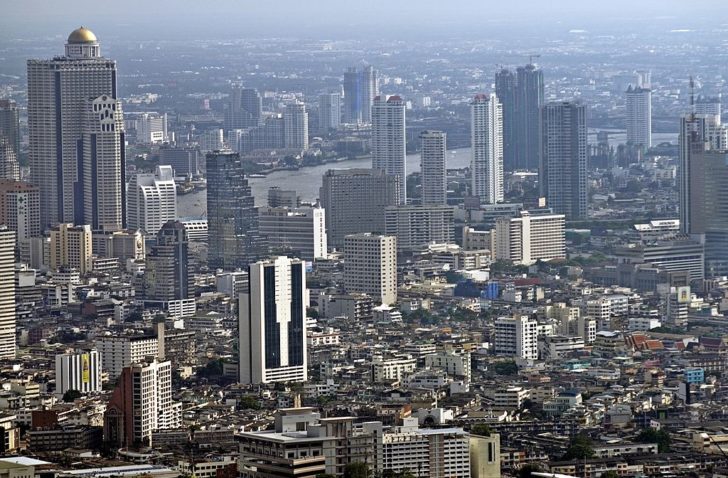 The Chao Praya River, with the State Tower (Royal Charoen
