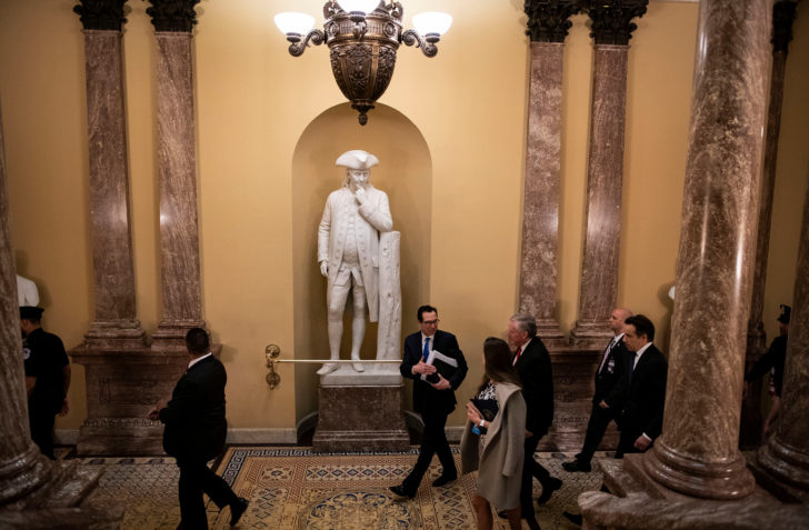 U.S. Secretary of the Treasury Steven Mnuchin and incoming White House Chief of Staff Rep. Mark Meadows (R-NC) walk to a meeting during negotiations on a coronavirus disease (COVID-19) relief package on Capitol in Washington