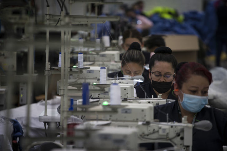 A Police Clothing Factory Manufactures Protective Masks And Gowns In Fight Against Coronavirus