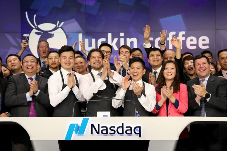 FILE PHOTO: Jenny Qian Zhiya CEO of Luckin Coffee and employees ring the opening bell to celebrate the company's IPO at the Nasdaq Market site in New York