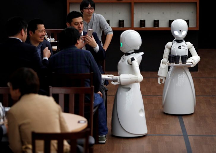 Remotely controlled robots OriHime-D serve customers at a cafe in Tokyo