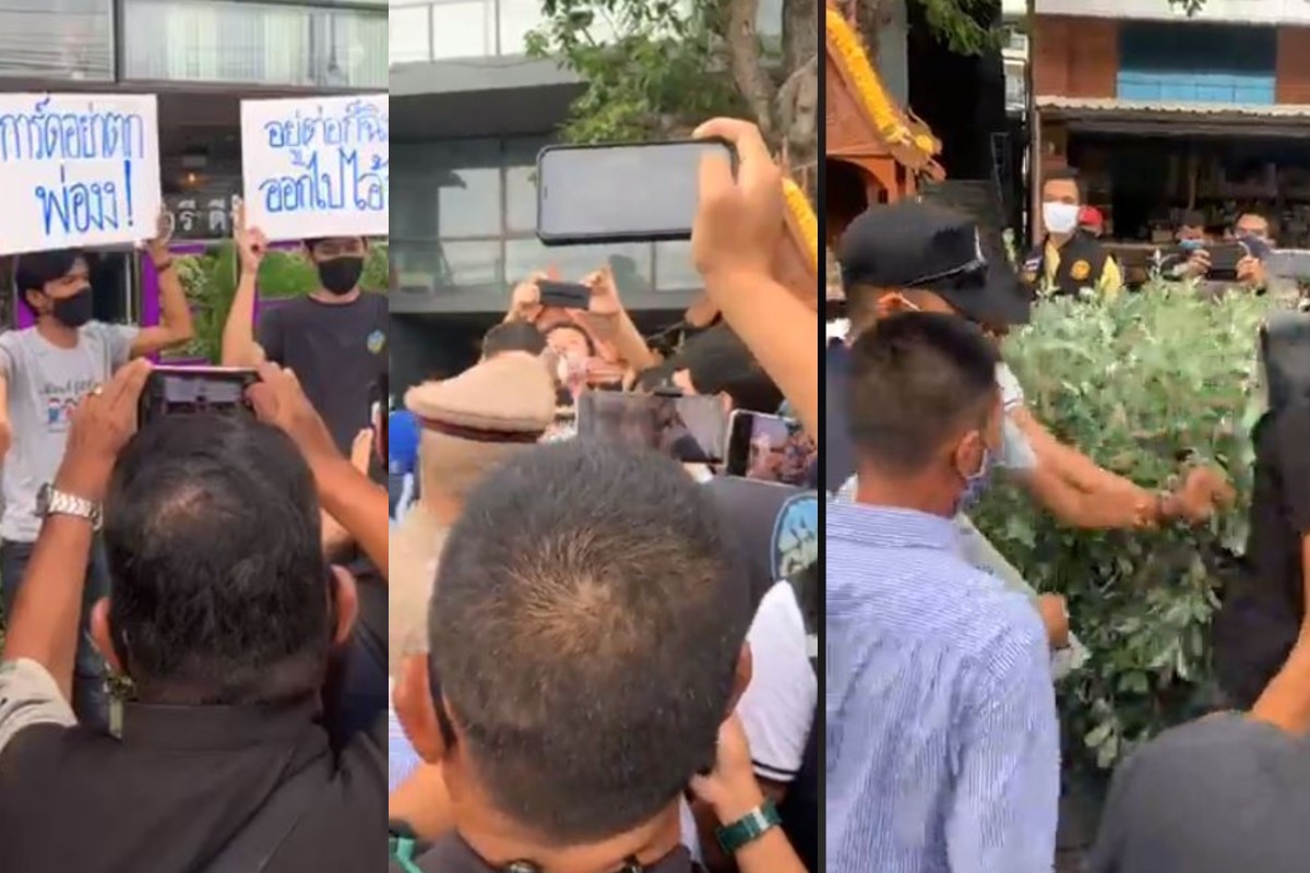 คุมตัว “2 หนุ่มระยอง” โผล่ชูป้ายประท้วงต้อนรับ “นายกฯ”