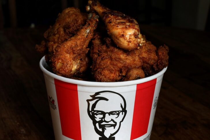 FILE PHOTO: A Kentucky Fried Chicken (KFC) bucket of mixed fried and grilled chicken is seen in this picture illustration เคเอฟซีงดเลียนิ้ว