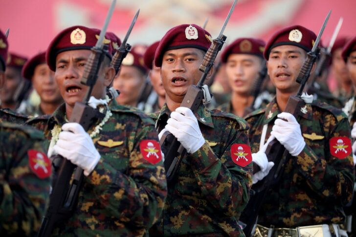 FILE PHOTO: Soldiers take part in a military parade to mark the 74th Armed Forces Day in the capital Naypyitaw