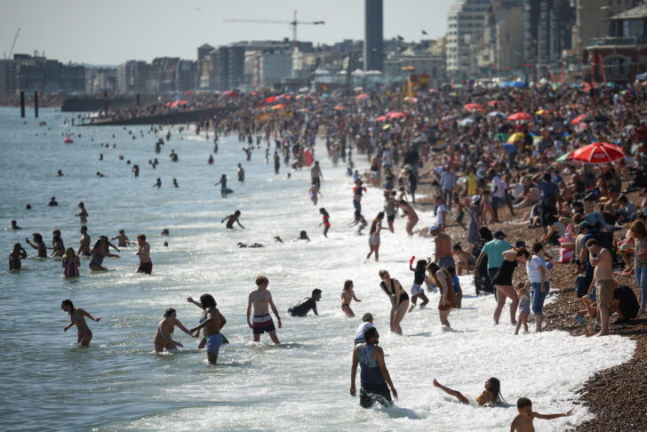People enjoy weather in Brighton