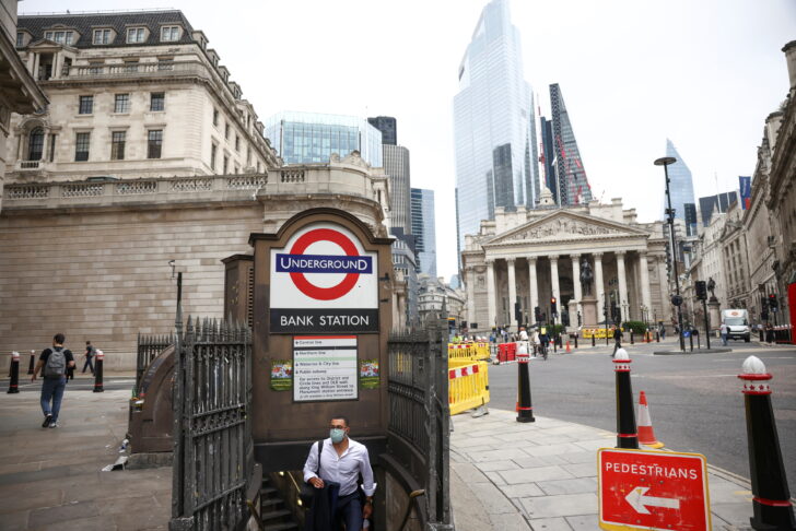 A person exits Bank underground station in the City of London financial district