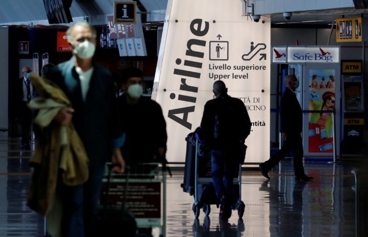 FILE PHOTO: FILE PHOTO: Italy allows travellers from Britain, the EU and Israel to enter without needing to quarantine