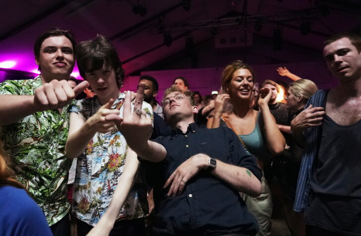 Attendees celebrate during the