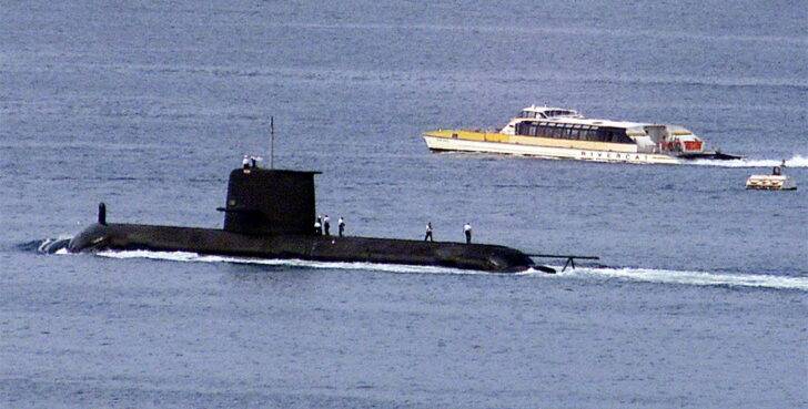 FILE PHOTO: COLLINS CLASS SUBMARINE HMAS WALLER PASSES RIVERCAT AS IT LEAVES SYDNEY HARBOUR.