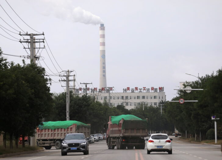 FILE PHOTO: Chimney of a China Energy coal-fired power plant is pictured in Shenyang,