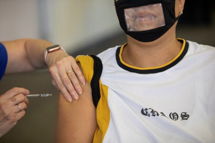 People receive COVID-19 booster vaccination in Michigan