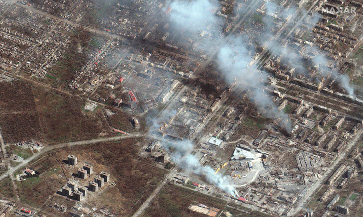 A satellite image shows buildings on fire in eastern Mariupol มาริอูปอล