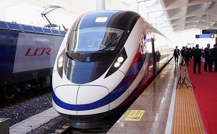 FILE PHOTO: A train is ready on the station during the handover ceremony of the high-speed rail project linking the Chinese southwestern city of Kunming with Vientiane in Laos