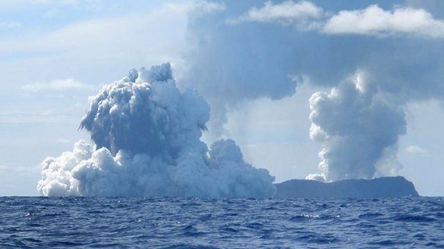 An undersea volcano is seen erupting off the coast of Tonga, sending plumes of steam, ash and smoke up to 100 metres into the air, on March 18, 2009 off the coast of Nuku'Alofa, Tonga.