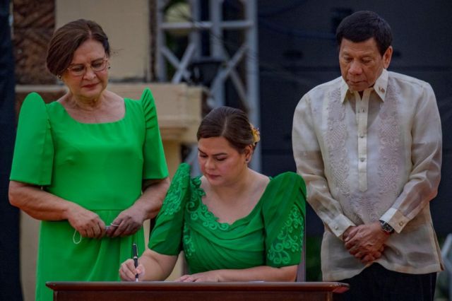 Sara Duterte, together with her father Philippine President Rodrigo Duterte and her mother Elizabeth Zimmerman, takes her oath as the next Vice President on June 19, 2022 in Davao, Philippines.