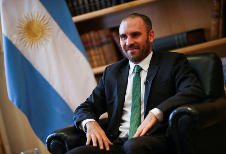 FILE PHOTO: Argentina's Economy Minister Martin Guzman poses for a picture before an interview with Reuters at the Economy Ministry, in Buenos Aires รัฐมนตรีเศรษฐกิจอาร์เจนตินาลาออก เซ่นวิกฤตเศรษฐกิจ-การเมือง