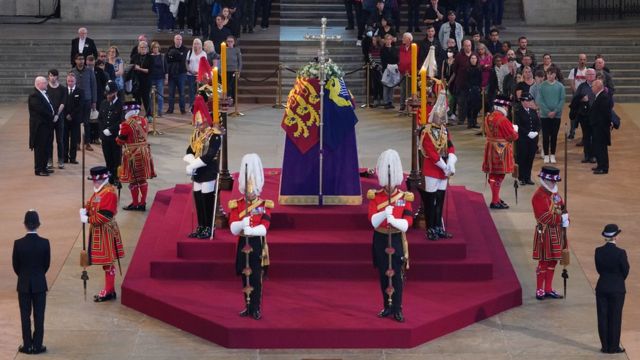 The first members of the public pay their respects as the vigil begins around the coffin of the Queen