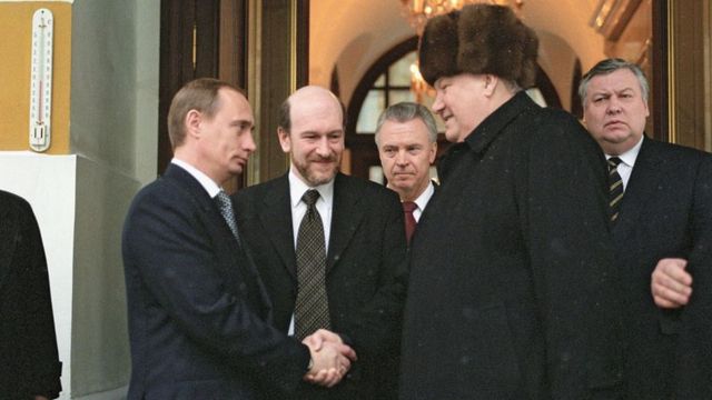 Putin and Boris Yeltsin