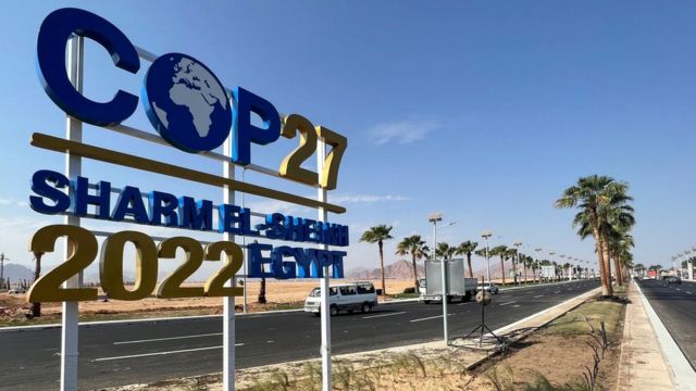 View of a COP27 sign on the road leading to the conference area in Egypt's Red Sea resort of Sharm el-Sheikh.