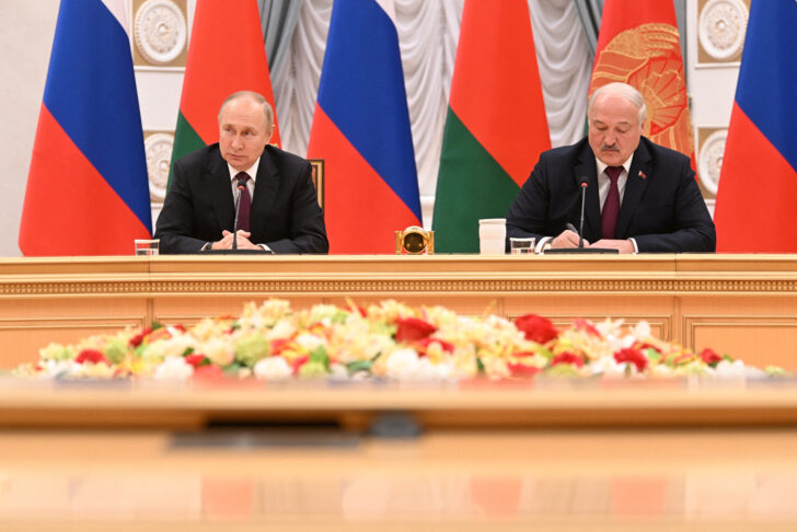 Russian President Vladimir Putin and Belarusian President Alexander Lukashenko attend a meeting in Minsk