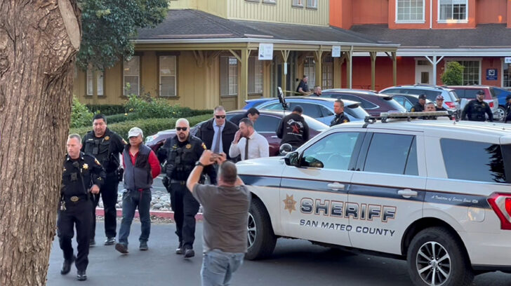 Police officers detain a man believed to be the Half Moon Bay mass shooting suspect ชุมชนเอเชียในสหรัฐ