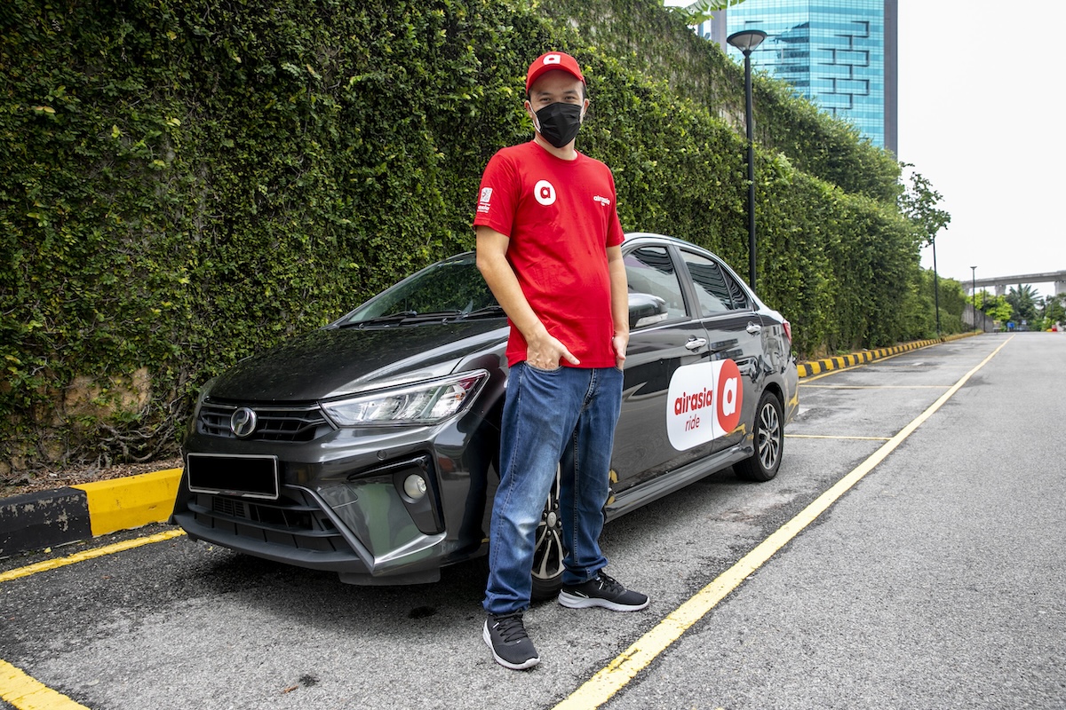 ภาพพนักงานขับรถ airasia Ride
