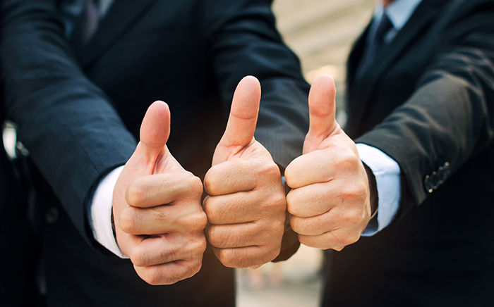 close up of hand group of handsome business people team in suit