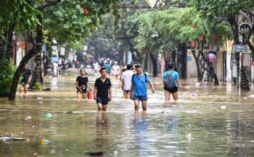 กรุงฮานอย หลังพายุไต้ฝุ่นยางิพัดผ่าน ภาพโดย NHAC NGUYEN / AFP