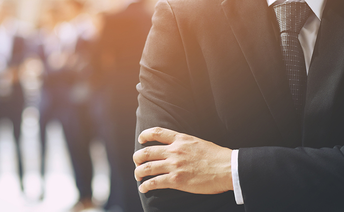 Portrait of a CEO businessman standing hand cross arm successful